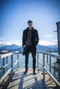 Handsome young man on Luzern lake`s shore Royalty Free Stock Photo