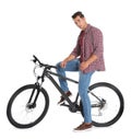 Handsome young man with modern bicycle