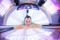 Handsome young man in a modern solarium Royalty Free Stock Photo