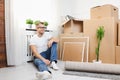 Handsome young man moving to a new home Royalty Free Stock Photo