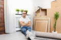 Handsome young man moving to a new home Royalty Free Stock Photo