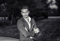 Handsome young man next to car in white shirt Royalty Free Stock Photo