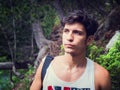 Handsome young man outdoor hiking in coutryside