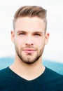 Handsome young man outdoor. Portrait of young man smiling. Royalty Free Stock Photo