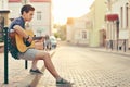 Handsome young man playing guitar Royalty Free Stock Photo