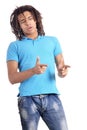 Handsome young man pointing against white background Royalty Free Stock Photo