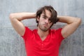 Handsome young man posing with hand in hair Royalty Free Stock Photo