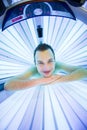 Handsome young man relaxing in a solarium Royalty Free Stock Photo