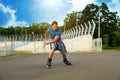 Handsome young man roller skating. Recreational activity Royalty Free Stock Photo