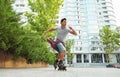 Handsome young man roller skating. Recreational activity Royalty Free Stock Photo