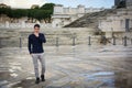 Handsome young man in Rome in front of Vittoriano monument