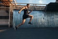 Handsome young man running in ndustrial building background Royalty Free Stock Photo