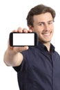 Handsome young man showing a blank smart phone display