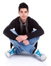 Handsome Young Man Sitting on the Floor Royalty Free Stock Photo