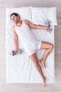 Handsome young man sleeping on bed Royalty Free Stock Photo