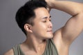 Handsome young man smelling his armpit after shower Royalty Free Stock Photo