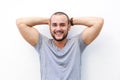 Handsome young man smiling with hands behind head Royalty Free Stock Photo