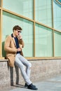 Handsome Young Man Speaking by Phone Royalty Free Stock Photo