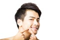 Handsome young man Squeezing pimple Royalty Free Stock Photo