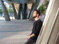 Handsome young man standing outdoors in the city Royalty Free Stock Photo