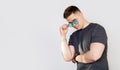 Handsome young man with sunglasses smiling with arms crossed Royalty Free Stock Photo