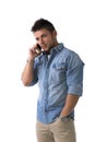 Handsome young man talking on cell phone (mobile), isolated Royalty Free Stock Photo