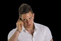 Handsome young man talking on mobile phone Royalty Free Stock Photo