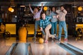 Handsome young man throwing bowling ball Royalty Free Stock Photo