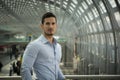 Handsome young man in train station or airport Royalty Free Stock Photo