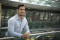 Handsome young man in train station or airport Royalty Free Stock Photo