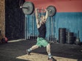 Young man training legs in gym Royalty Free Stock Photo