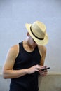 Handsome young man traveling and looking at his mobile. Royalty Free Stock Photo