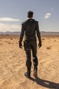 handsome young man wearing a futuristic black combat uniform. desert mars landscape.