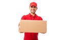 Handsome Young Man Wearing Red Uniform Delivering Package Royalty Free Stock Photo