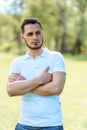 Handsome young man in white t-shirt outdoor in. Lifestyle, human Royalty Free Stock Photo