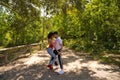 Handsome young man and woman dancing bachata and salsa in the park. The couple dance passionately surrounded by greenery. Dancing Royalty Free Stock Photo