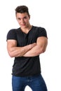 Handsome young muscular man looking at camera