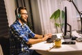 Young programmer working at home late in evening Royalty Free Stock Photo