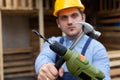 Handsome repairman holding tools Royalty Free Stock Photo