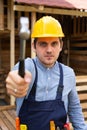 Handsome repairman holding tools Royalty Free Stock Photo