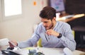 Handsome young smiling businessman working with documents Royalty Free Stock Photo