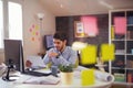 Handsome young smiling businessman working with documents Royalty Free Stock Photo