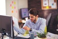 Handsome young smiling businessman working with documents Royalty Free Stock Photo