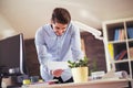 Handsome young smiling businessman working with documents Royalty Free Stock Photo