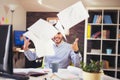 Handsome young smiling businessman working with documents Royalty Free Stock Photo