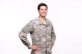 Handsome young soldier posing with hands on hips Royalty Free Stock Photo