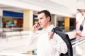 Handsome young and successful businessman talking on his mobile phone Royalty Free Stock Photo