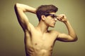 Handsomeand muscular male model wearing eyewear