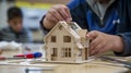 A handson activity where students build a small model house using miniature tools and materials fostering their interest Royalty Free Stock Photo