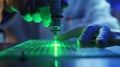 A handson shot of a laboratory technician using a laser ablation technique to etch a material and form a